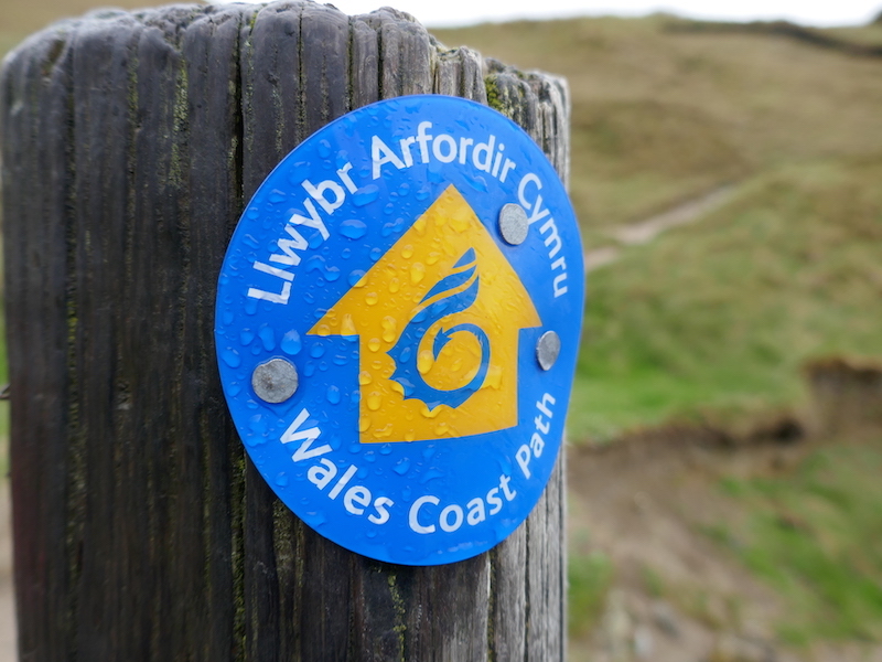 Signpost for wales coast path - Carmarthen car-free
